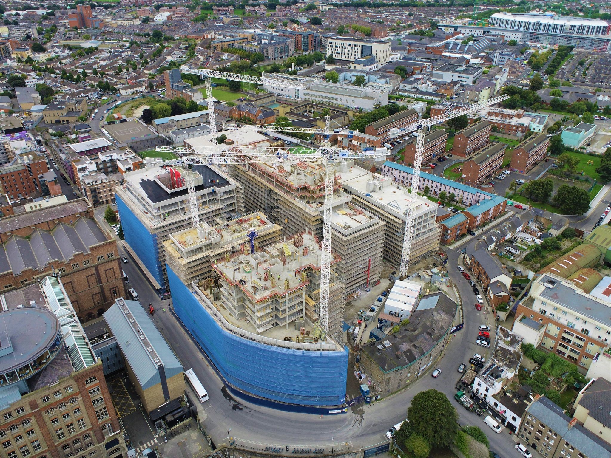 Large scale development financing for vertical rise residential construction with or without a contracted offtake.